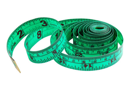 Folded green measuring tape on white background