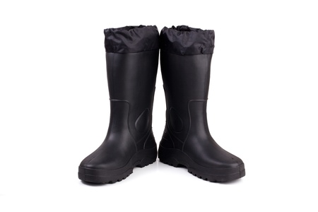A pair of black rubber boots on a white backgroundの写真素材