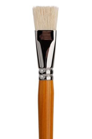 A large flat brush to paint on a white backgroundの写真素材