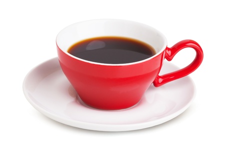 Red cup with instant coffee on a white saucer on a white backgroundの写真素材