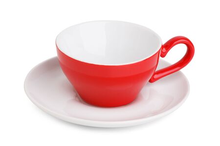 Empty red coffee cup on a saucer on a white backgroundの写真素材