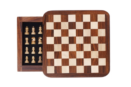 Board with a little pocket chess on white backgroundの写真素材