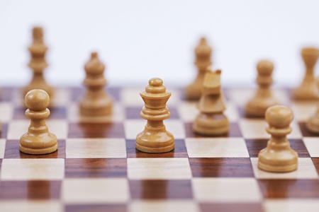 Chess pieces, placed in position on the chessboardの写真素材