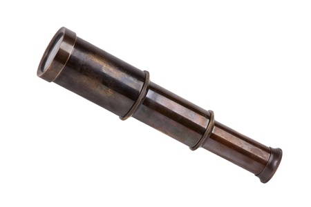 Antique folding telescope of copper on a white backgroundの写真素材