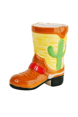 Ceramic mug in the form of boots on a white backgroundの写真素材