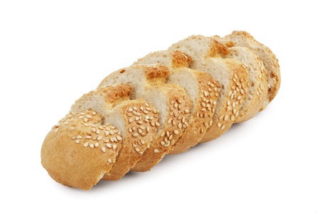 Cut into slices of French bread roll on white backgroundの写真素材