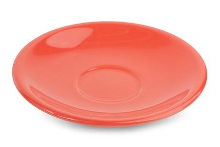 Ceramic saucer pink on a white backgroundの写真素材