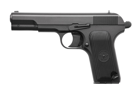 Pistol with a cocked on a white backgroundの写真素材