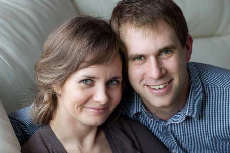 Portrait of a young couple at homeの写真素材