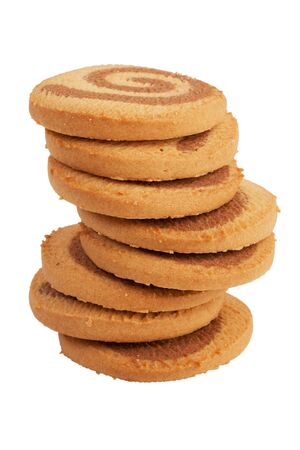 The high pile of biscuits on a white backgroundの写真素材