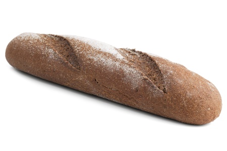 Loaf of black rye bread with flour on a white backgroundの写真素材