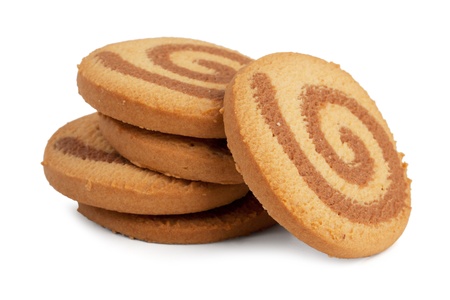 Small pile of orange round cookies on a white backgroundの写真素材