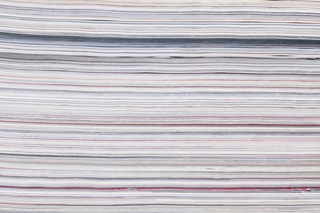 Densely stacked logs on a white backgroundの写真素材