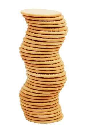 The high stack of biscuits figure on a white backgroundの写真素材