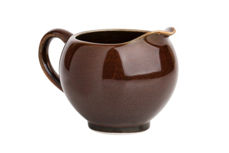 Pitcher for brewing tea or milk on a white backgroundの写真素材