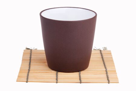 Chinese cup for drinking tea on a white backgroundの写真素材