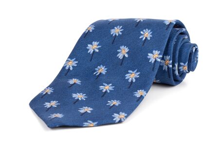 Rolled male blue tie on a white backgroundの写真素材