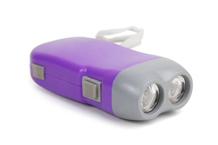 Purple small flashlight on a white backgroundの写真素材