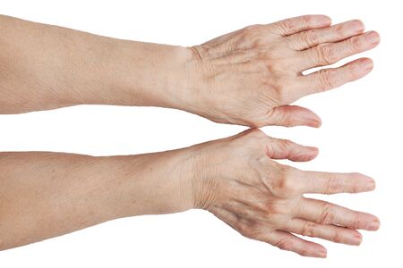 The hands of an old man on a white backgroundの写真素材