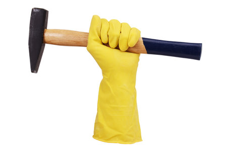 Hand in rubber glove with a hammer on a white background