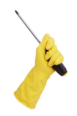 Gloved hand holding a screwdriver on white backgroundの写真素材