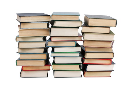 Several stacks of books on a white backgroundの写真素材
