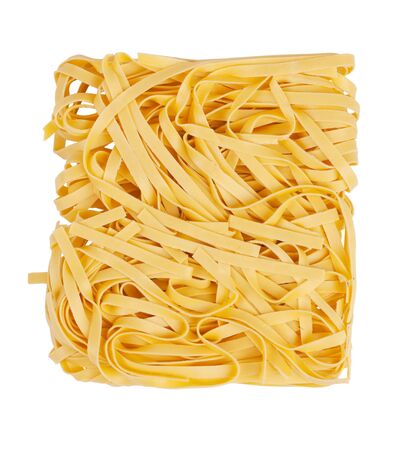 Packing noodles tangled on a white backgroundの写真素材