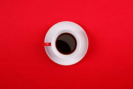 Porcelain coffee cup and saucer white on a white backgroundの写真素材