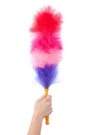 Striped brush for cleaning the dust on a light backgroundの写真素材