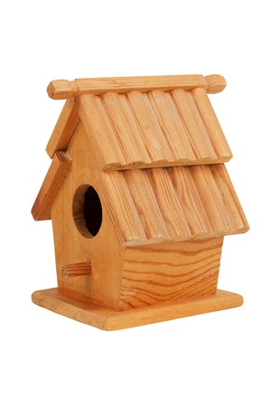 Small wooden birdhouse on a white backgroundの写真素材