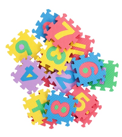 Puzzle in a variety of figures on  white backgroundの写真素材
