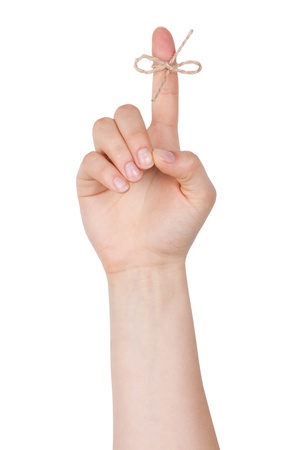 The index finger to a node on  white backgroundの写真素材
