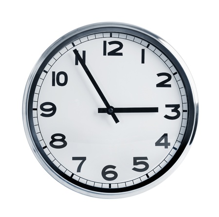 Office wall clock with a round faceの写真素材