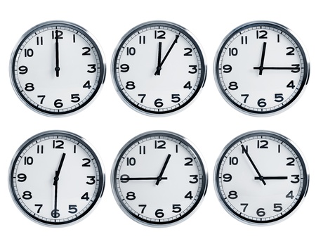 Wall clocks with different time on a dialの写真素材