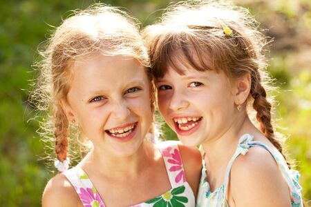 Two girlfriends on a summer day fun laughの写真素材