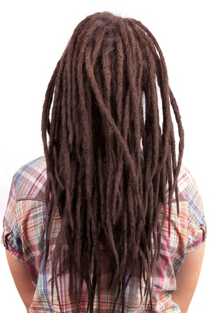 Young girl with dreadlocks in a checkered shirtの写真素材