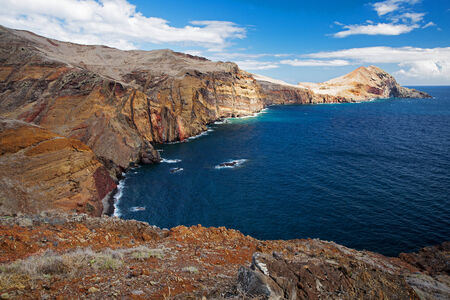 Scenic landscape with high mountains on the ocean coastの写真素材
