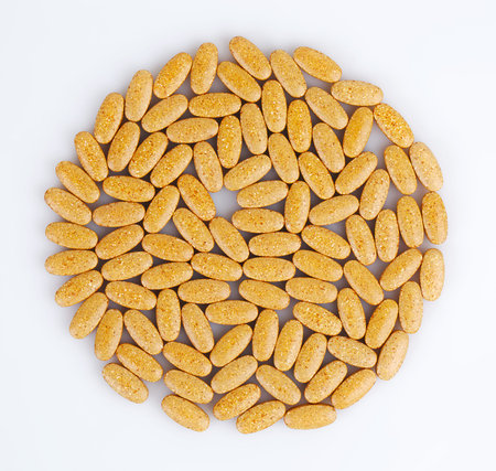 Orange pills in the form of a circle