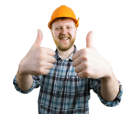 Man in a orange helmet shows that all is wellの写真素材