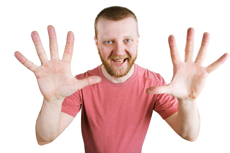 Bearded man shows two hands with fingersの写真素材