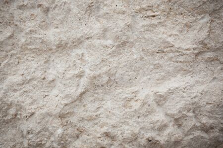 Stone surface of white color with cracksの写真素材