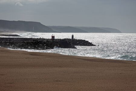 Landscape with atlantic ocean and mountains in the distanceの写真素材