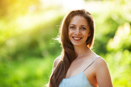 Portrait of a beautiful young woman with long hairの写真素材