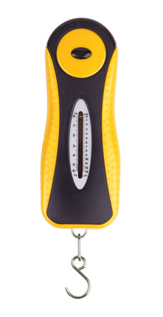 Yellow and black plastic scales on white backgroundの写真素材