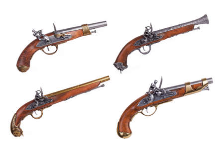 Four vintage pistols on a white backgroundの写真素材