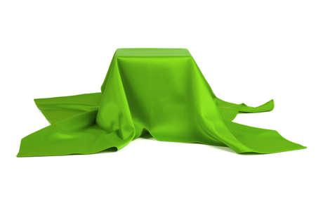 Subject covered with green cloth on a white backgroundの写真素材
