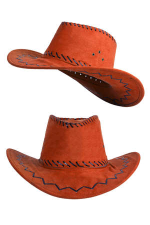 Brown cowboy hat with trim on white backgroundの写真素材