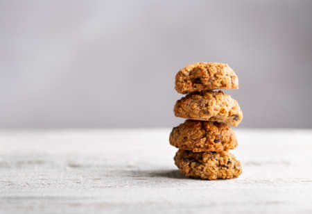Stack of fresh oatmeal cookies lies on the tableの写真素材