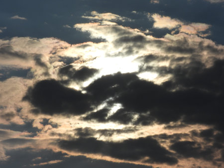 The photo shows a cold sky with dark clouds before the rain. The image conveys the mood of a gloomy...