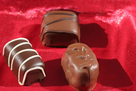 Chocolate on red silk